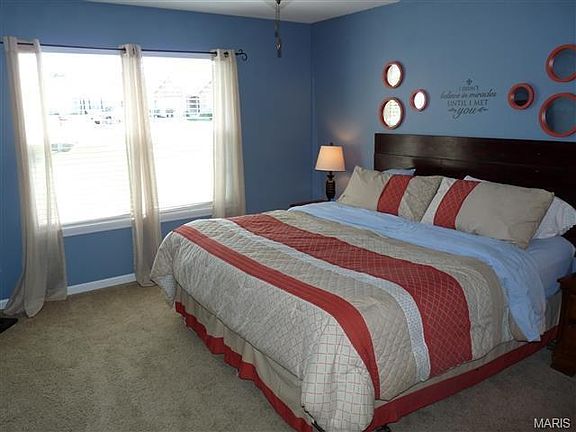 Vaulted master bedroom with private master bath & walk in closet.