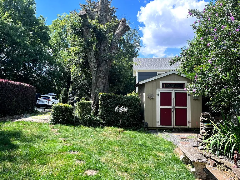 Rear, shed, pond and fountain