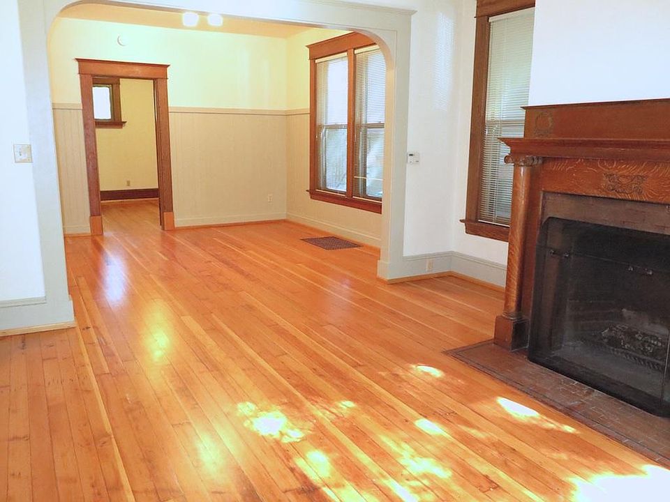 Living room and dining area with view to bedroom