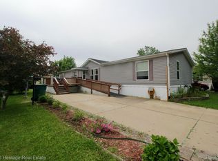 634 Grandshire Blvd, Fowlerville, MI