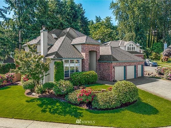 Meticulously maintained home on an oversized corner lot with stunning curb appeal.