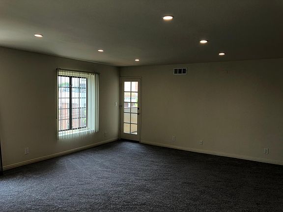 Living Room angle picture towards balcony door
