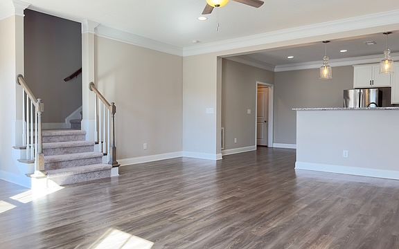 Living room, kitchen, pantry, half bath on main level