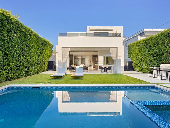 Grab a seat at the outdoor counter bar or relax on the pool side sunloungers