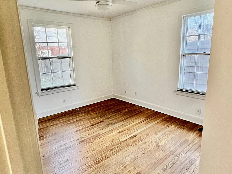 Secondary bedroom or office with overhead ceiling fan