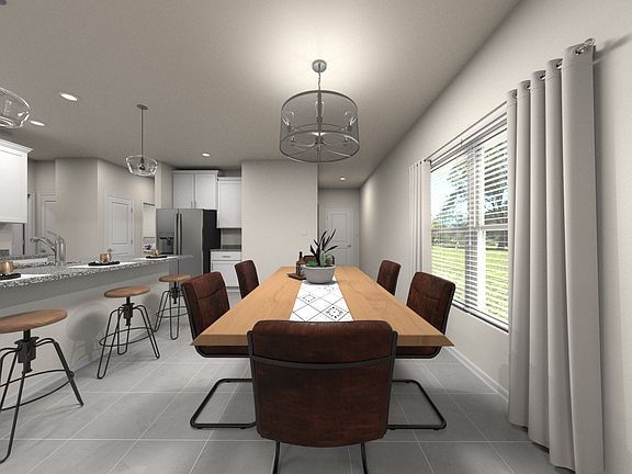 Gather with friends and family in the dining area.