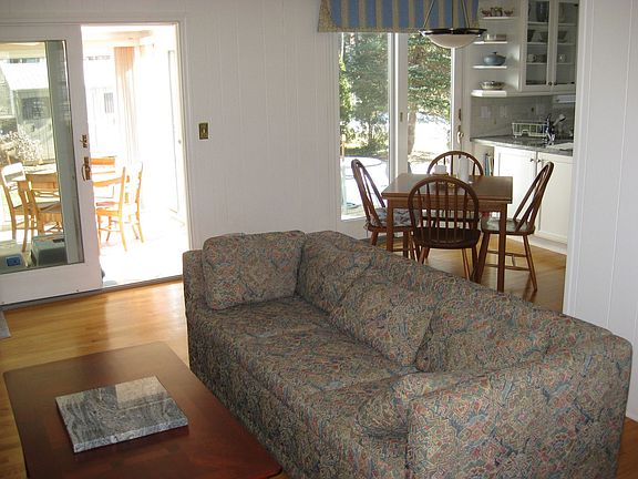 Family room (open floor plan) adjacent to sun-room & eat-in kitchen