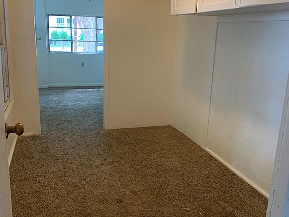 Closet area for bedroom, walk through this to get into the bedroom