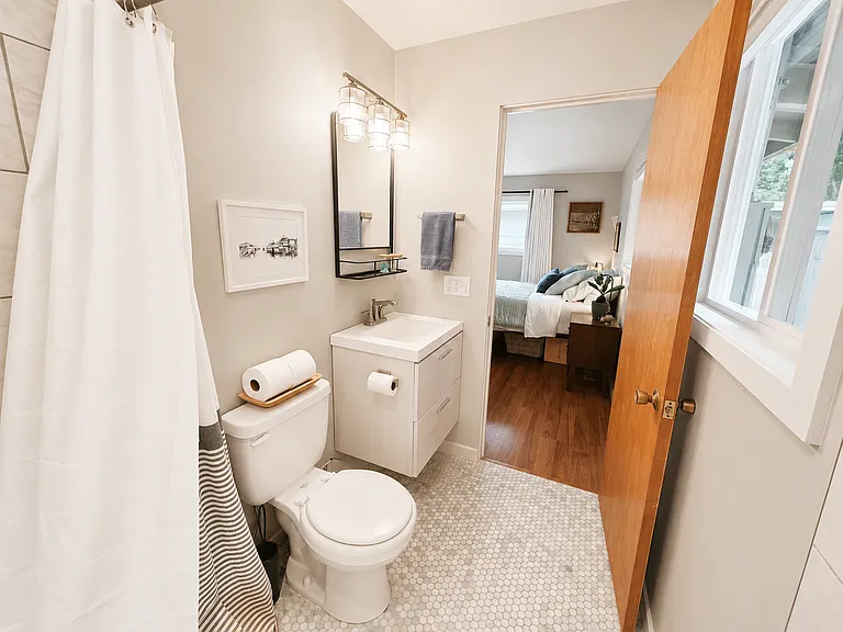 Ensuite 3/4 Bathroom - Wall Mounted Vanity - Large Tile Shower with Dual Shower heads