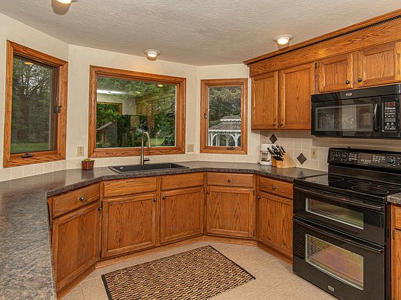 5th image of 8665 Candleberry St NW
