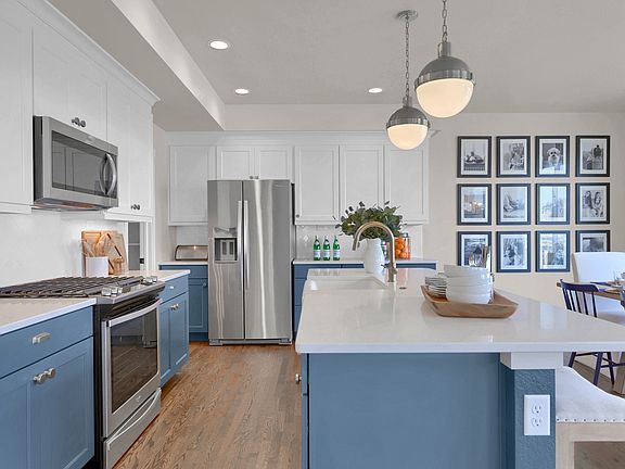 Open kitchen. Photo representing home to be built and may demonstrate optional features