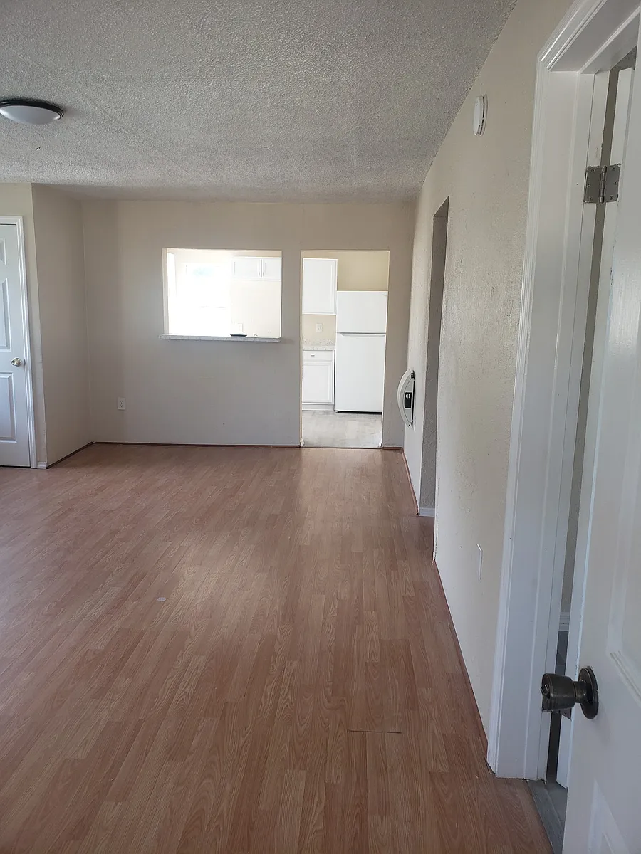 Living Room with kitchen bar - 634 W 10th St
