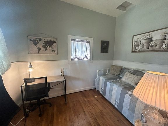 Front bedroom with desk and daybed for overflow sleeping if needed.