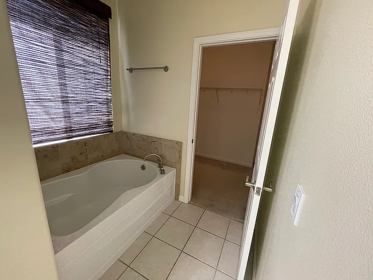 Master bath - tub + closet