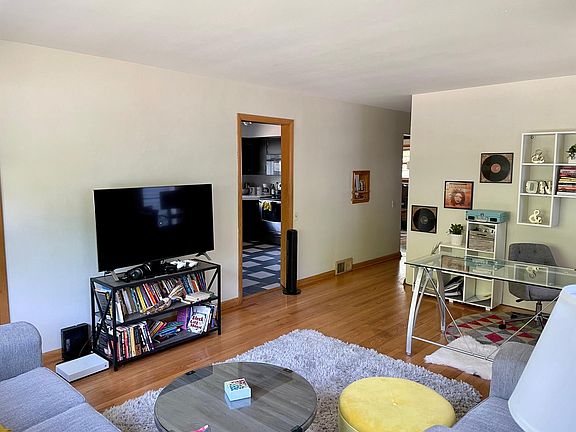 Large living room with hardwood floors.