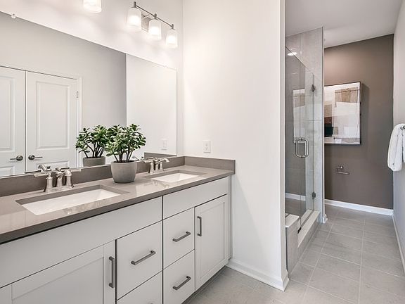 Double vanity in private owner s bath