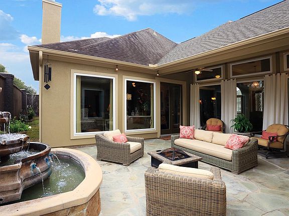 View in courtyard looking back to the house. The wonderful view is enjoyed from several rooms in the