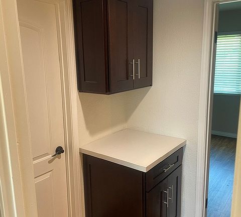 Coming up the stairs, Linen closet/cupboards. Bedroom # 2 to the right.