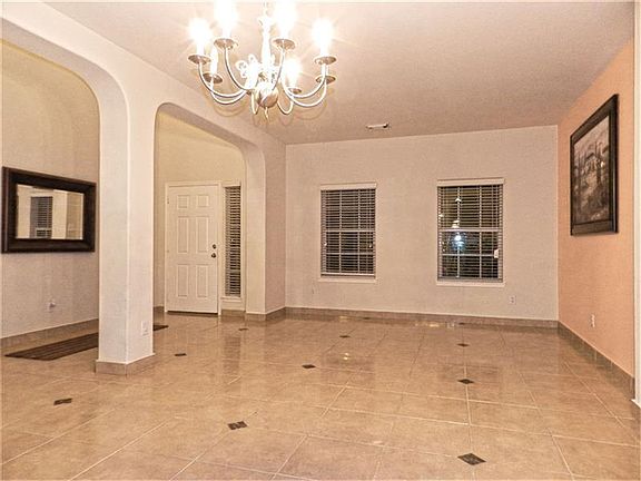 Very open formal living room and dining room with all tile floors