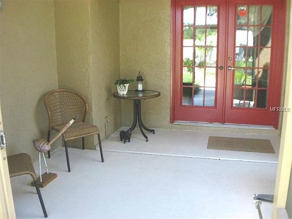 Inviting Covered & Screened Entry