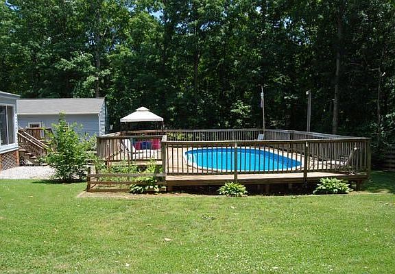 Lovely pool with deck surrounding 