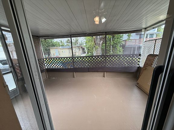 Enjoy a generous screened porch for year-round outdoor living, plus rare dedicated parking directly outside with space for up to 3 cars.