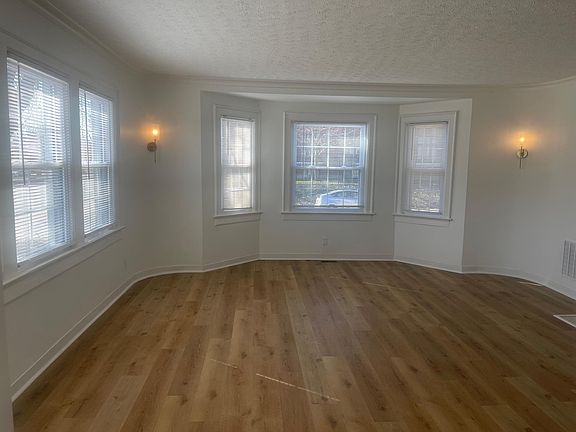 Spacious Living Room with tons of light. New insulated windows throughout.