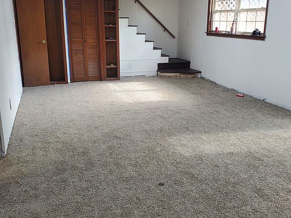 Baseboards to be installed new carpet plenty of space