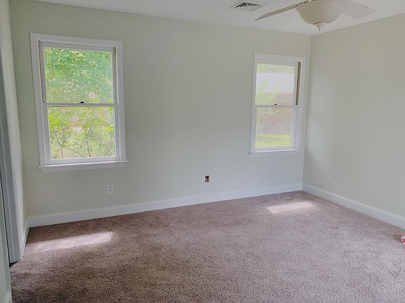 Spacious Master Suite with a walk in closet and double vanity in the bathroom