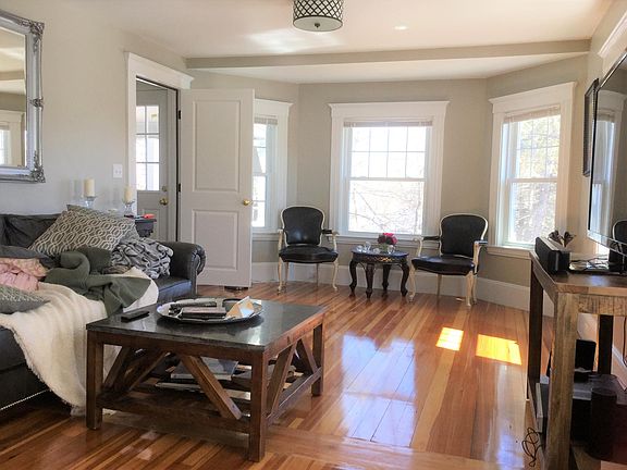 Tons of windows in large living room