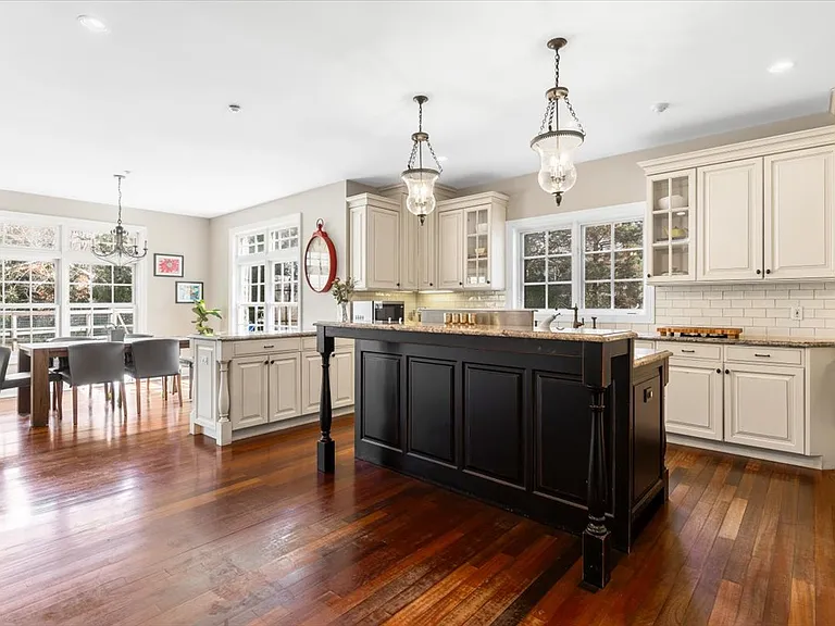 Eat-in-Kitchen, with granite counters and new appliances and door to yard