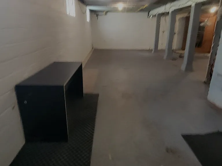 Large basement with lots of storage areas