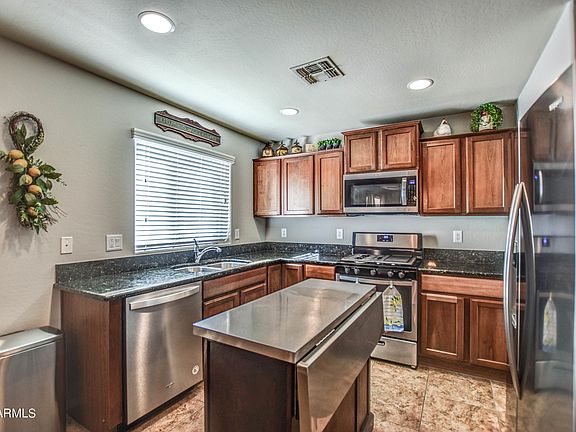 3rd image of 7925 W Desert Blossom Way