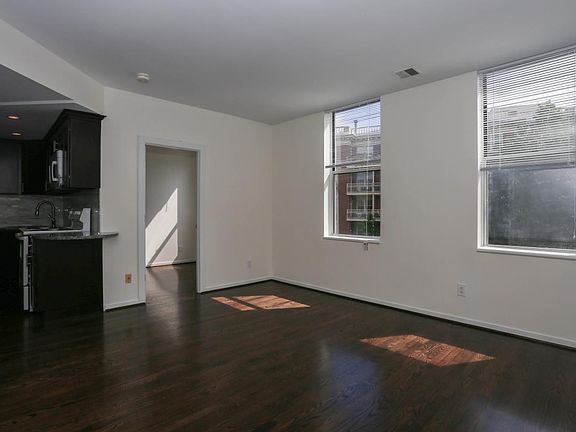 Spacious Open Living Area with Large Windows