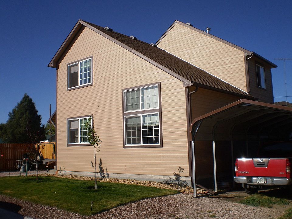 Added carport, nice front lawn