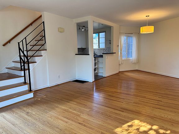 Living room looking at the dining space and kitchen