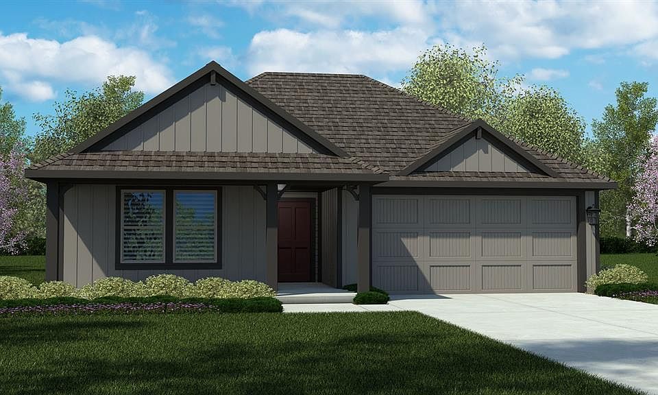 Front Elevation - D.R. Horton''s JustinFloorplan Elevation Z - All Home and community information, including pricing, included features, terms, availability and amenities, are subject to change at any time without notice or obligation. All Drawings, pictures, photographs, video, square footages, floor plans, elevations, features, colors and sizes are approximate for illustration purposes only and will vary from the homes as built.