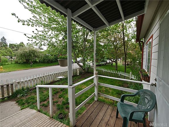Nice covered front porch, last house at the end of the dead end street, tons of privacy.