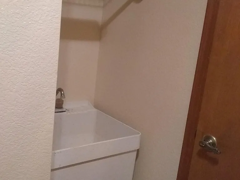 Other side of laundry room with washtub