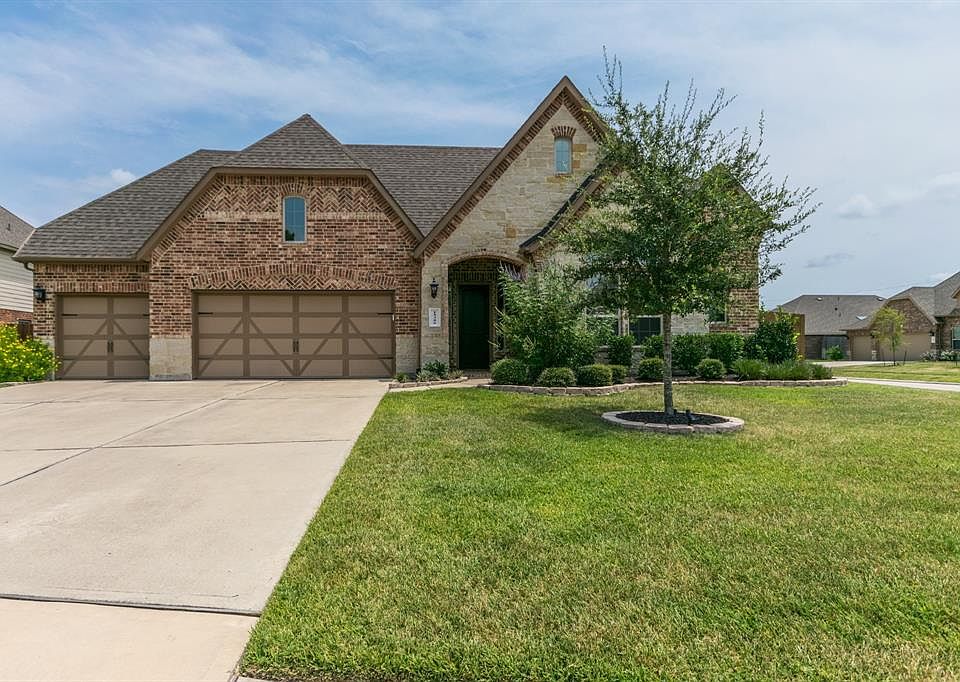 Welcome to this beautiful DR Horton with brick and stacked stone elevation.
