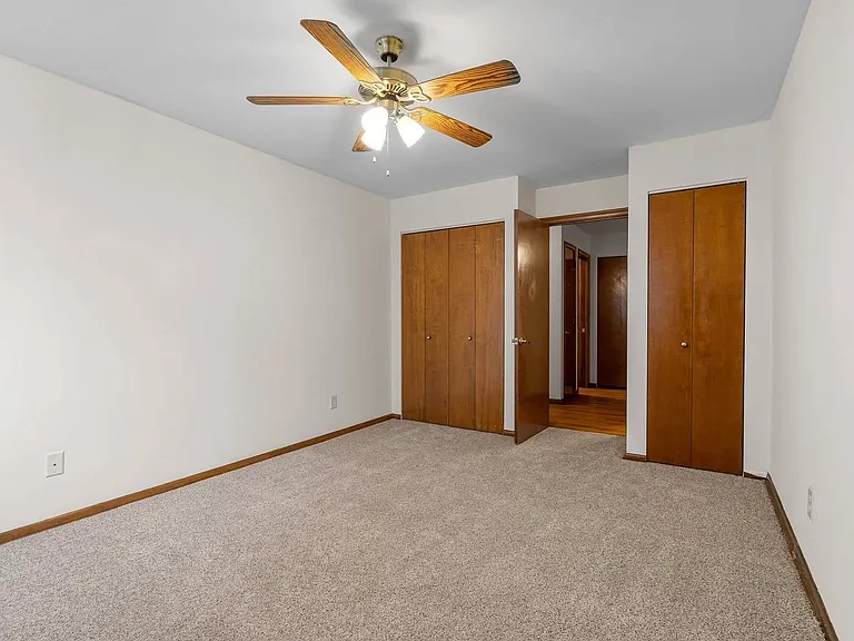 Welcome to Central Lakes of Uptown, where comfort meets style in spacious living. This inviting room features plush carpeting, warm lighting, and ample storage. Ready to elevate your lifestyle? Schedule your tour today!