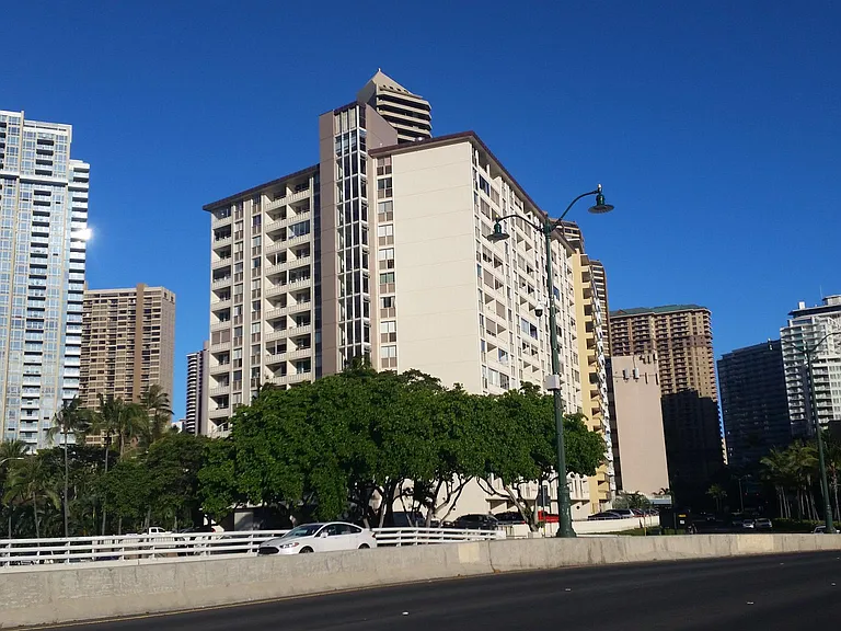 As you cross the Ala Moana Bridge into Waikiki, Harbor View Plaza is the first building on the left