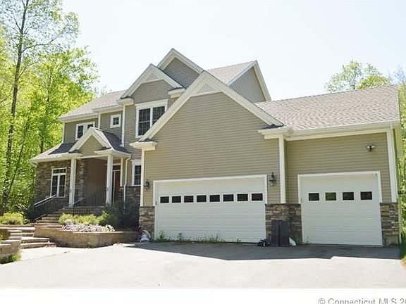 Stone facade and walkway gi...