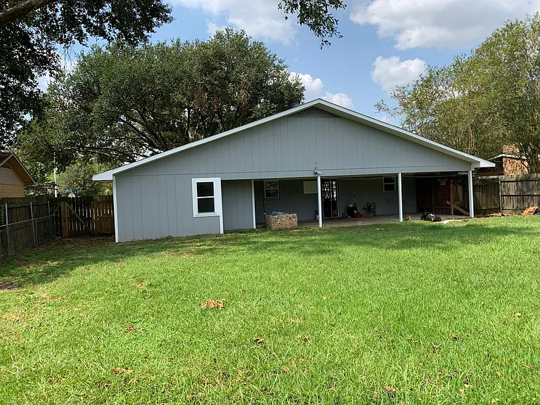 Back view of house with spacious back yard (Fenced)