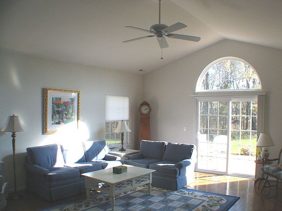 Great room  with Vaulted ceilings and sliding doors to patio