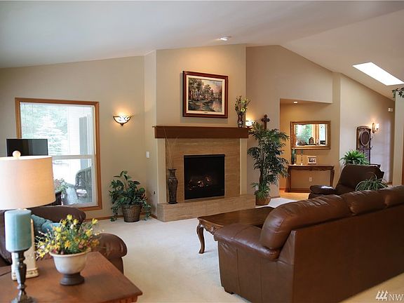 Built in wine cabinet and interior illuminated glass ware cabinets add to the ambiance. There is also lighting under the cabinets to light the counter top.