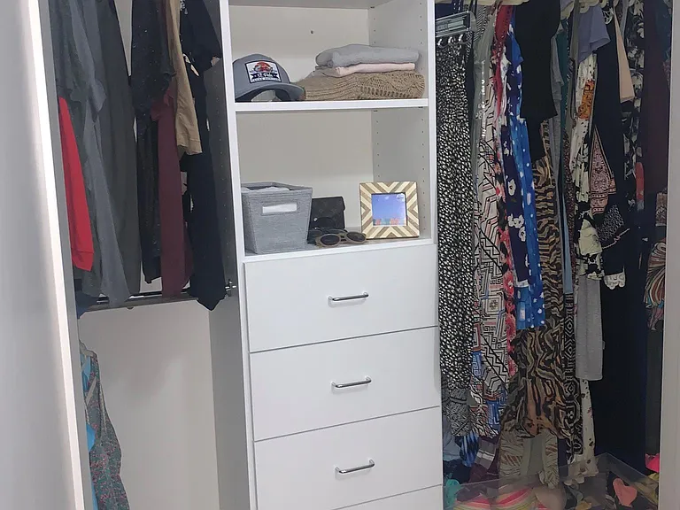 Den features double door closet space