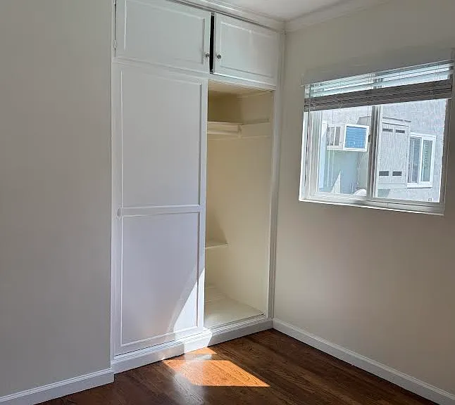 Closet has storage area above it