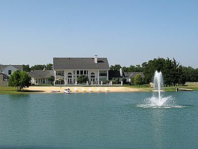 From acroos the private lake back to the house.