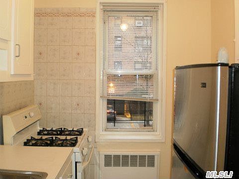 2nd image of 3344 91st St APT 1M